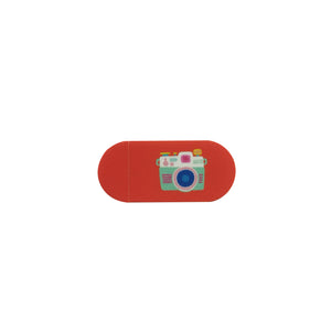 kırmızı üzerinde fotoğraf makinesi görseli olan kamera kapatıcısı